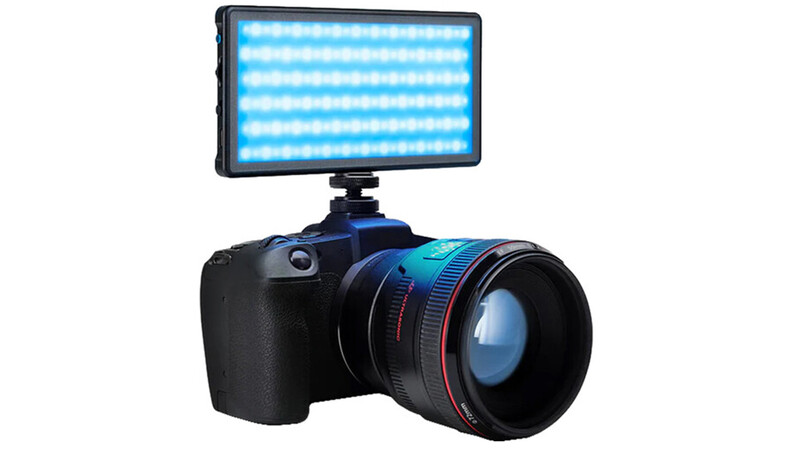 DSLR camera with blue LED panel light mounted on hot shoe.