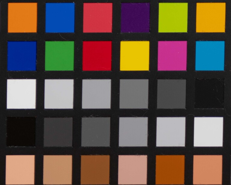 Color reference chart displaying six rows of swatches in a grid, ranging from vibrant hues to neutral tones.