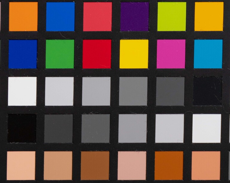 Color reference chart displaying six rows of colored squares including primaries, secondaries, neutrals, and skin tones.