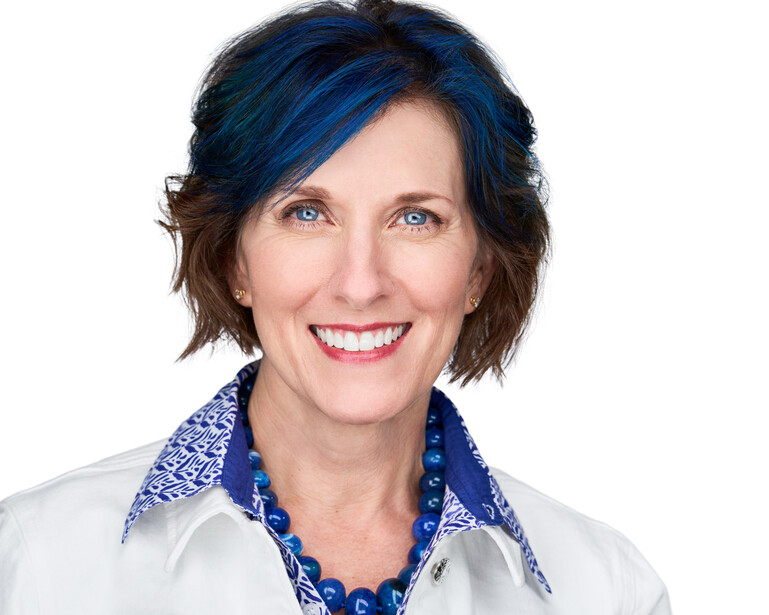 Real estate leader poses for headshot session