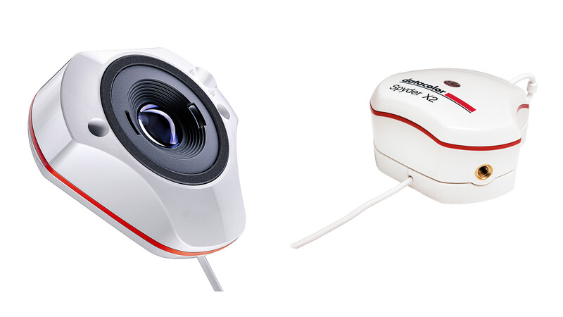 Two white and red compact cameras shown from different angles against a white background.