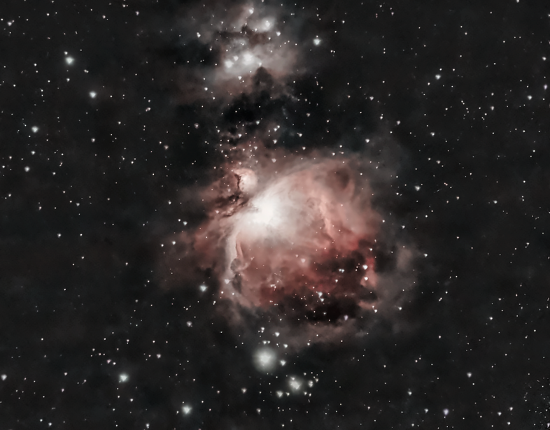 Deep-sky astrophotography of the Orion Nebula region showing bright nebulosity and star clusters against dark space.