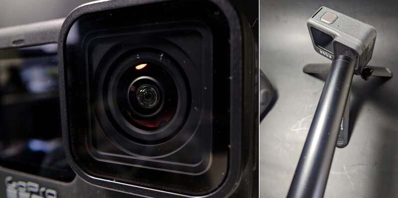 Close-up of a compact action camera lens with wide-angle optics, mounted on an extending pole with stabilization grip.