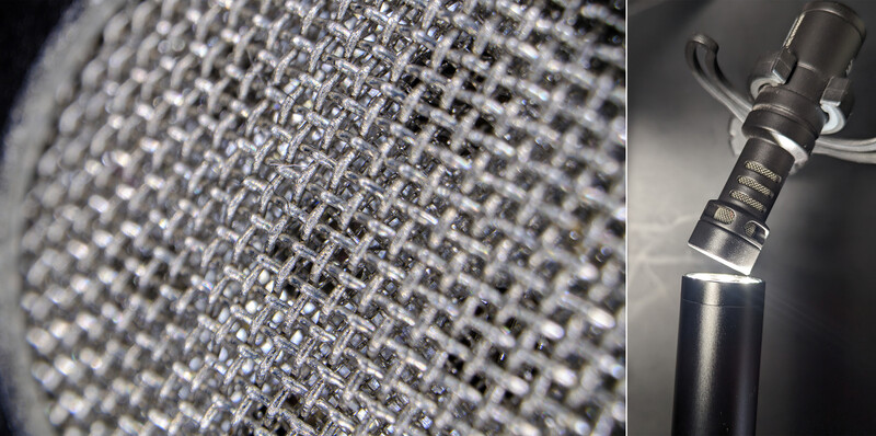 Close-up macro photography of a woven fabric texture showing intersecting threads in sharp detail.
