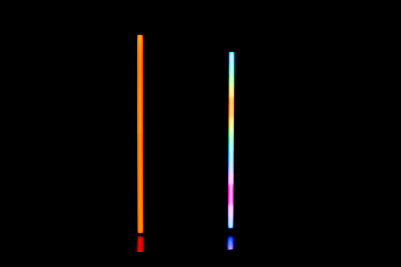 Graphic comparison of two vertical light gradients against black background.