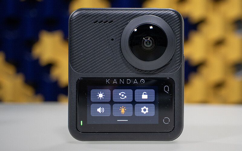 The back of the QooCam 3 features an easy-to-use touchscreen interface.
