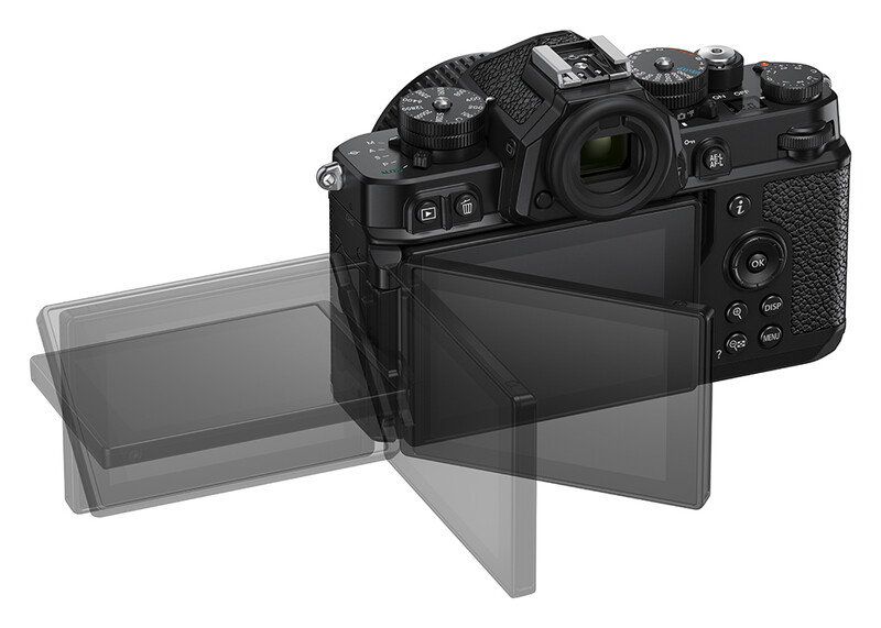 Mirrorless camera with articulating LCD screen extended at angle, showing rear controls and textured grip.