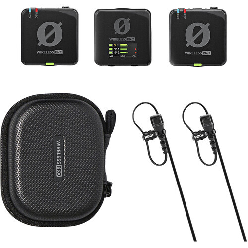 Wireless microphone system components including three compact transmitter units, a carrying case, and two lavalier microphones.