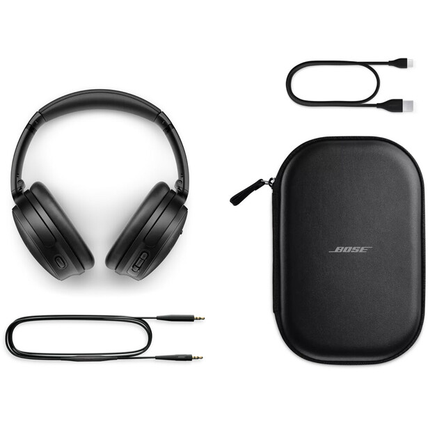 Bose headphones with carrying case and charging cables displayed as a complete product set.