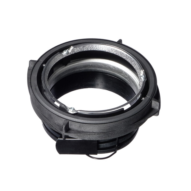 Close-up of a camera lens adapter ring with internal glass elements and mounting threads visible.