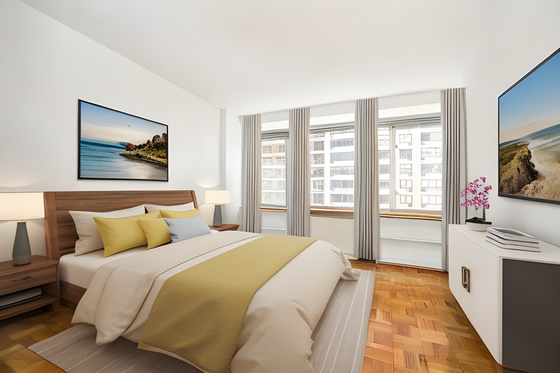 Modern bedroom with yellow bedding, wooden headboard, and large windows overlooking a city.