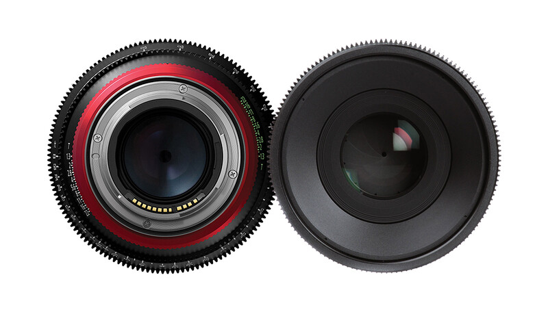 Rear view of two cinema camera lenses showing lens mount details and optical glass elements.