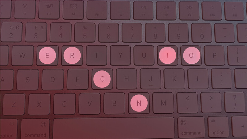 Keyboard with pink highlighted keys spelling out E, R, I, O, G, and N against burgundy keys.