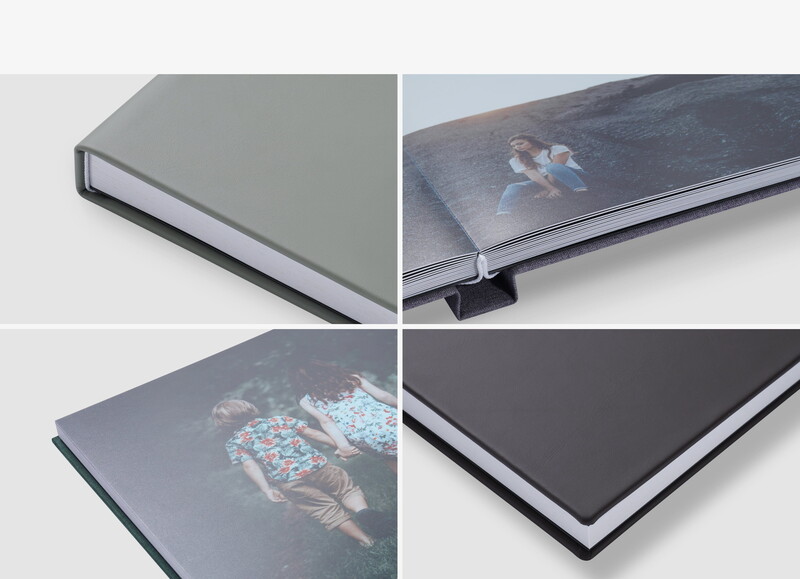 Four angled views of hardcover photo books showing different cover designs and binding details.