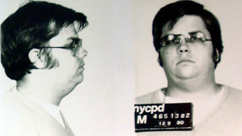 Mugshot-style photograph showing side and front profile views of a person wearing glasses.