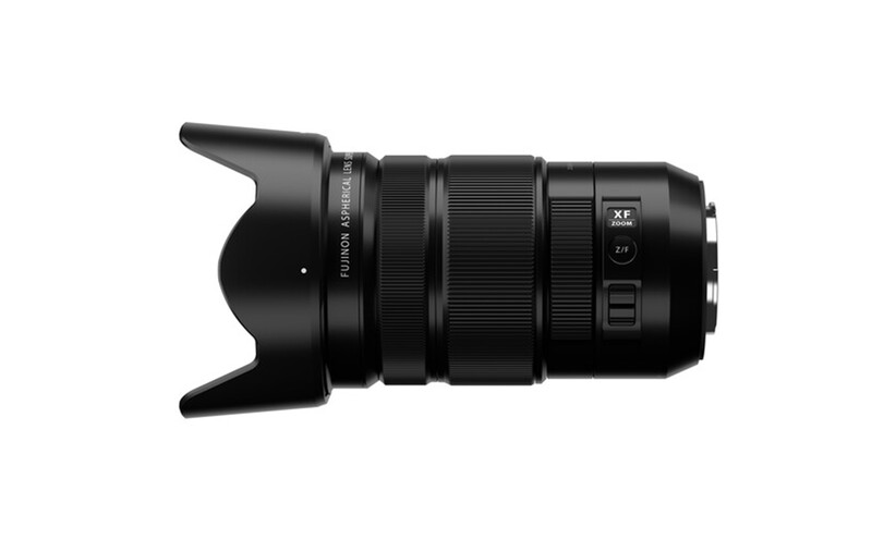 Black telephoto zoom lens with lens hood and focus ring controls against white background.