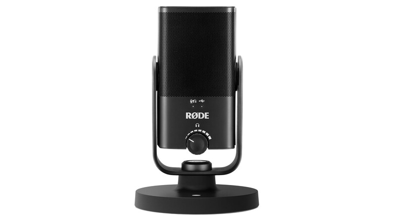RODE NT1 Signature Series condenser microphone on black desktop stand.