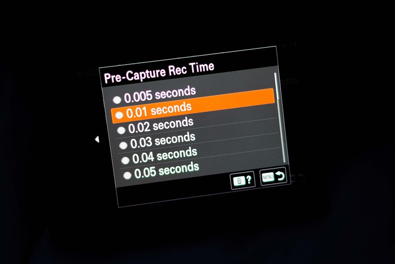 Screenshot of a camera menu showing pre-capture rec time options ranging from 0.005 to 0.05 seconds, with 0.01 seconds highlighted.