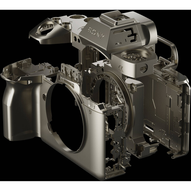Cutaway view of a digital camera showing internal mechanical and electronic components against a black background.