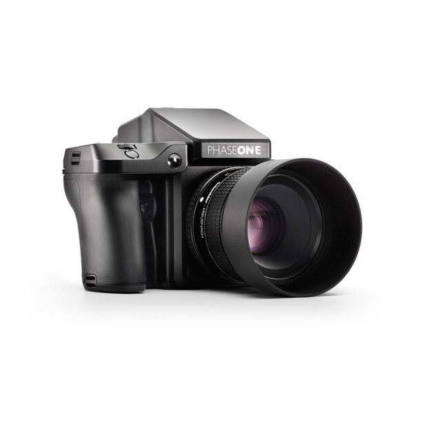 Hasselblad medium format camera with prime lens mounted, positioned at three-quarter angle against white background.