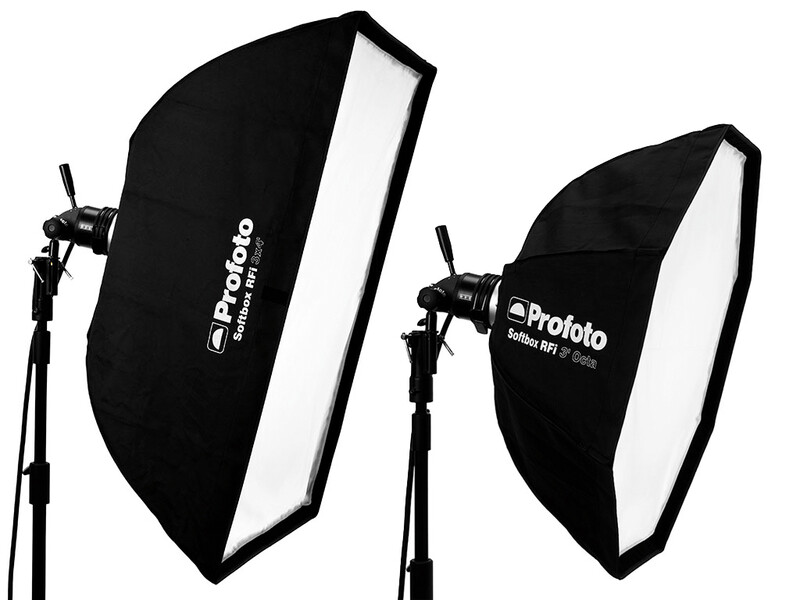 Two black octagonal softboxes with white diffusion panels mounted on light stands.