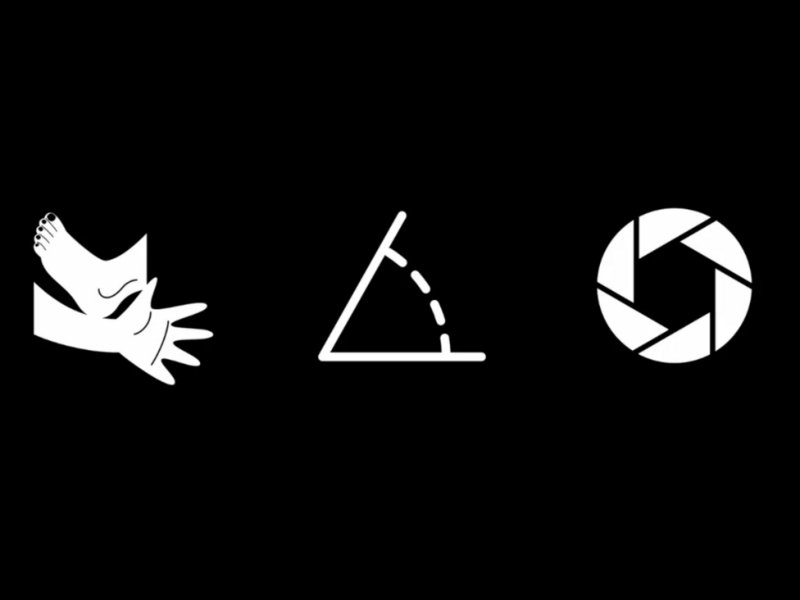 Graphic illustration showing three photography-related symbols: a hand gesture, a triangle with measurement line, and a circular aperture design.