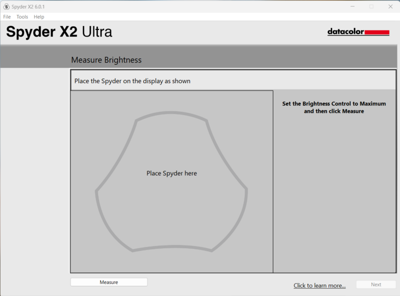 Screenshot of Spyder X2 Ultra software showing brightness measurement interface with device placement diagram.
