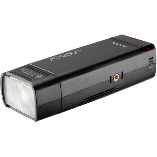 Compact black flash unit with rectangular body and front diffuser panel.