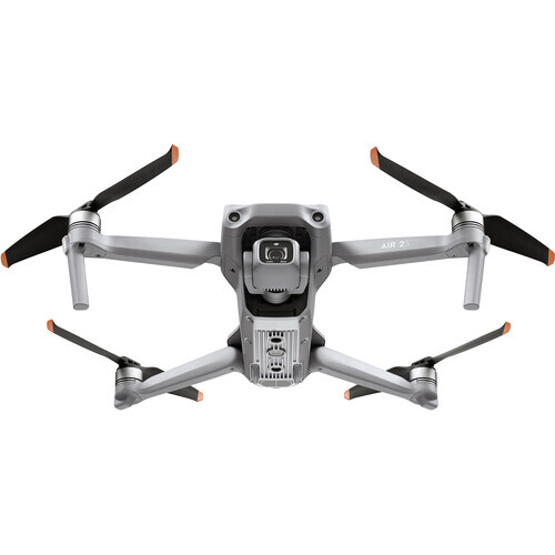 Compact drone with foldable arms and four propellers displayed from above against a white background.