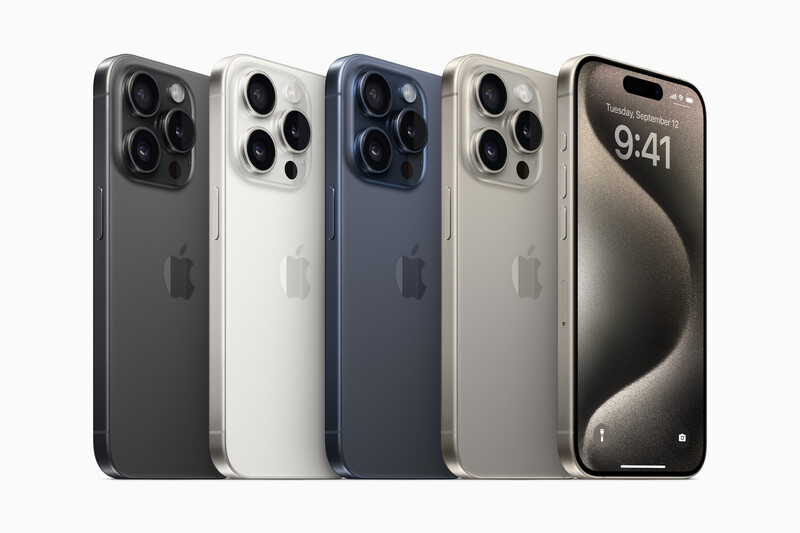 Five smartphone models arranged in a row, displaying various colors and a front-facing display on the rightmost device.