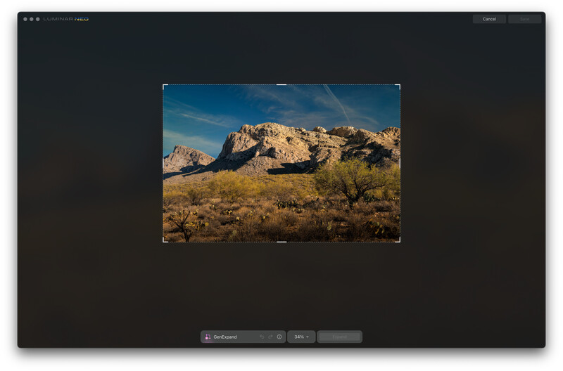 Screenshot of a desktop image editing interface displaying a desert landscape with mountains and sparse vegetation.