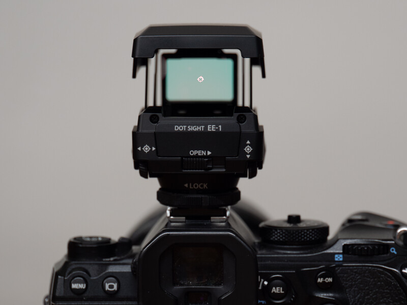 DOT Sight EE-1 electronic viewfinder mounted on DSLR camera body against neutral background.