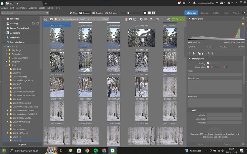 Screenshot of photo management software displaying a grid of winter landscape photographs.