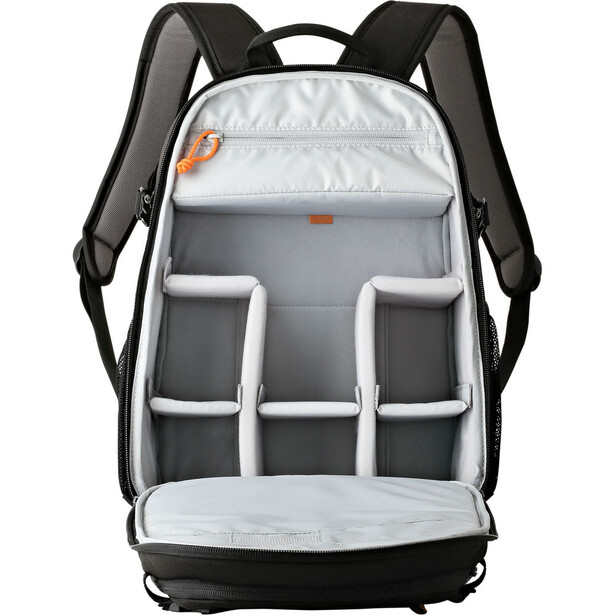 Camera backpack with open compartment showing padded dividers and storage pockets.