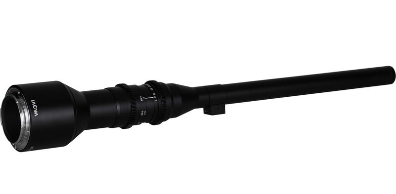 Black rifle scope with extended barrel and adjustment turrets mounted on top.