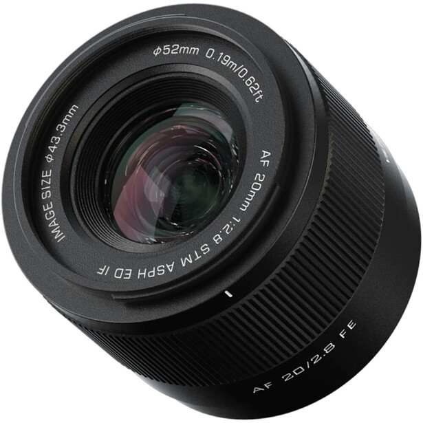 Black prime lens with ribbed barrel and visible glass elements in the front optic group.
