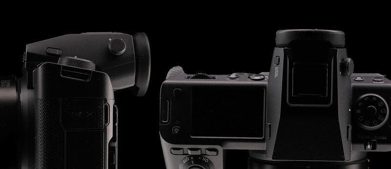 Three digital cameras shown in profile against a black background, displaying various form factors and control layouts.