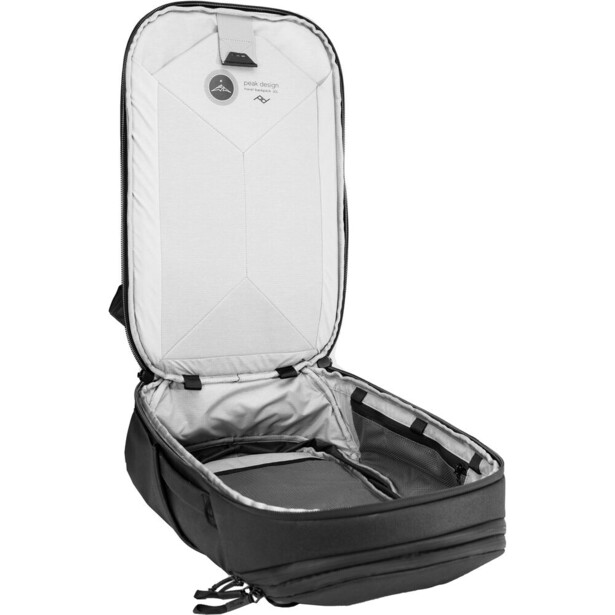 Open camera backpack with padded interior compartments and weatherproof design.