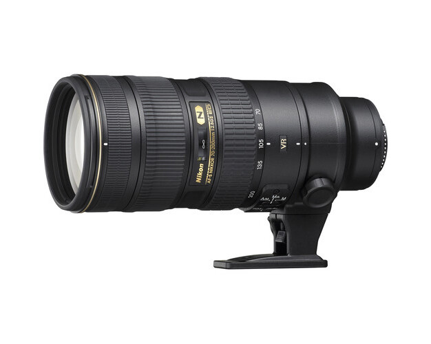 Black telephoto zoom lens with focus ring and AF/MF switch mounted on tripod collar.