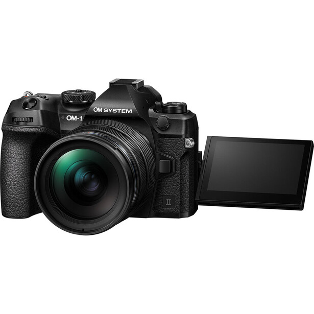 OM System OM-1 mirrorless camera with articulating rear screen extended and wide-angle lens attached.