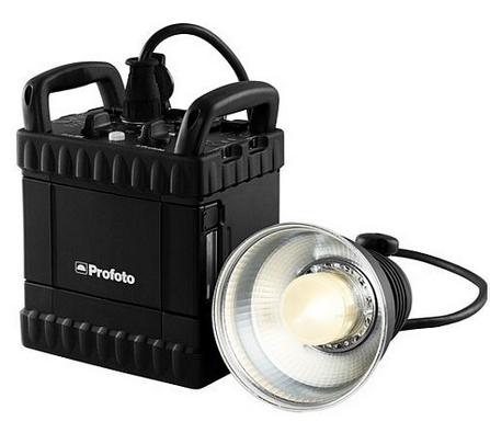 Profoto B10 Plus monolight with carrying case and connecting cable displayed against white background.