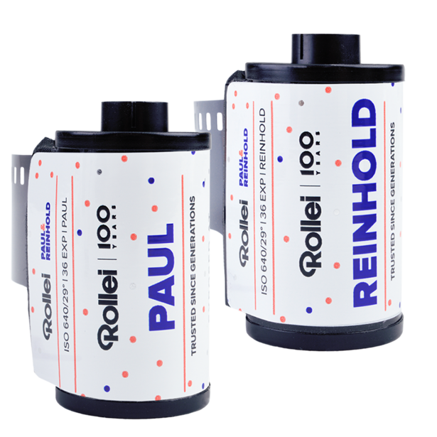 Two rolls of Fujifilm Rollei Renhold 400 color film with black tops and white labels featuring blue and red text and design elements.