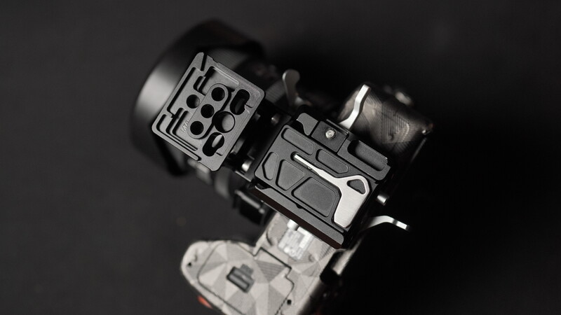 Overhead view of a cinema camera mounted on a support rig with follow focus and matte box accessories.