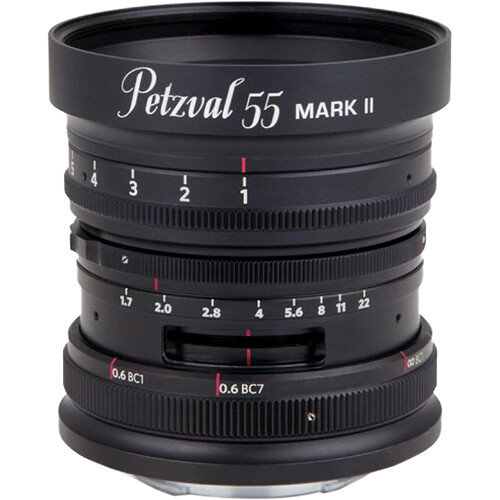 Petzvai 55mm Mark II lens showing focus and aperture rings with depth of field markings.