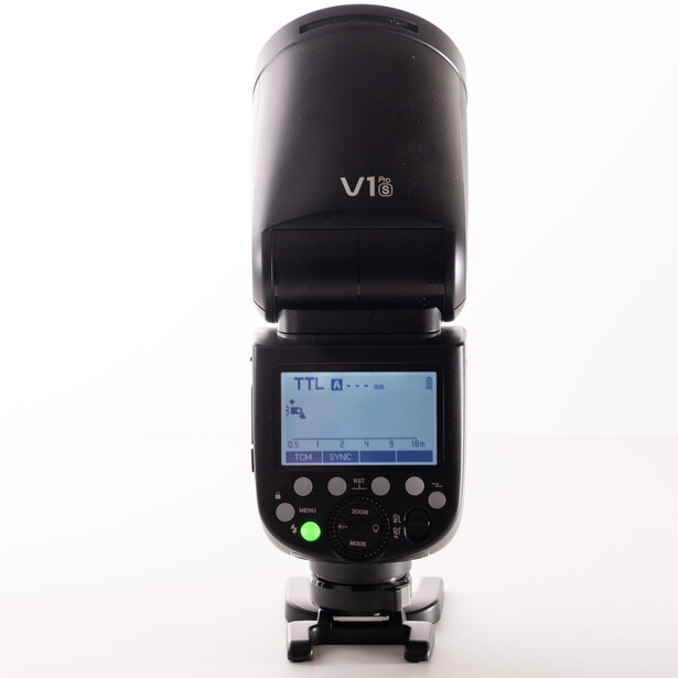 Godox V1 flash unit with LCD screen displayed against white background.