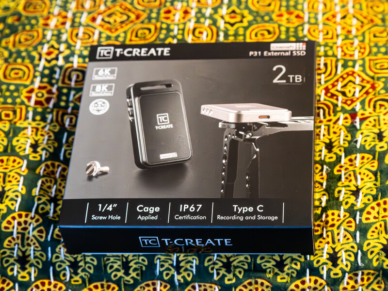 Packaging box for a T-Create 2TB external SSD with product specifications and device imagery.