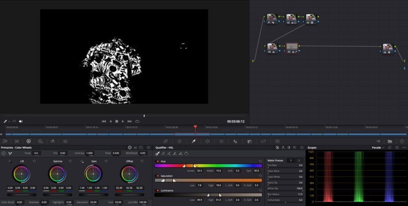 Screenshot of video editing software showing a high-contrast white silhouette of a person's head against black background.