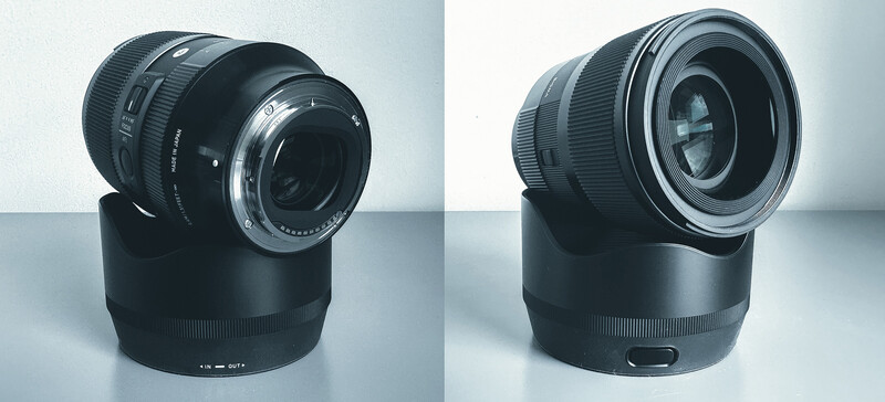 Two views of a camera lens mounted on a black focus motor ring against a gray background.