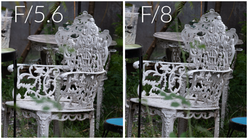 Ornate white garden chair photographed at f/5.6 and f/8 apertures showing depth of field comparison.