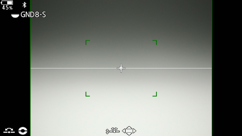 Screenshot of a camera's electronic viewfinder display showing a level indicator and manual focus controls.